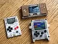 An Arduboy compared to other open consoles Pokitto and Gamebuino.