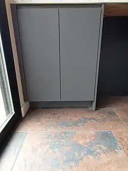 Our tiles had to match or to go along with the colors of the cabinet fronts…