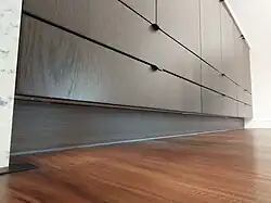 The dining row with toe kicks