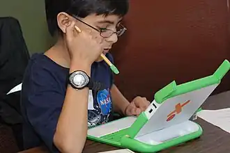 A person using a laptop.
