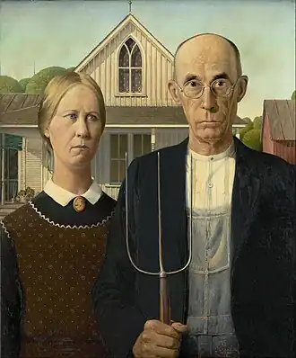 American Gothic Social Realism painting by Grant Wood - 1930.