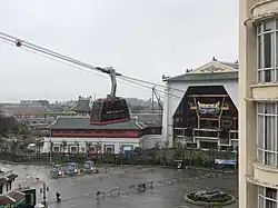 A gondola lift has cabins suspended from a continuously circulating cable whereas aerial trams simply shuttle back and forth on cables.