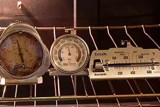 A variety of analog oven thermometers