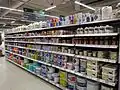 Rows of paint cans at a store