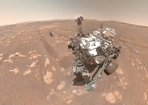 A mars rover takes a selfie.