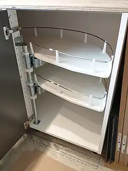 An opening of the corner pull-out comprises two stages: