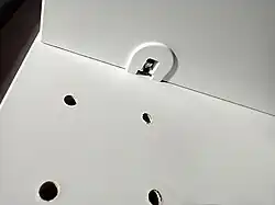 Special pin in a Sektion support shelf (high cabinets only)