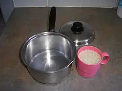 1. Fill cup with desired amount of rice.
