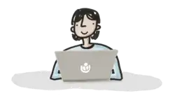 A person using a laptop.